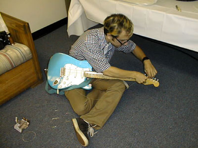 Charles Stringing Bob's  Guitar